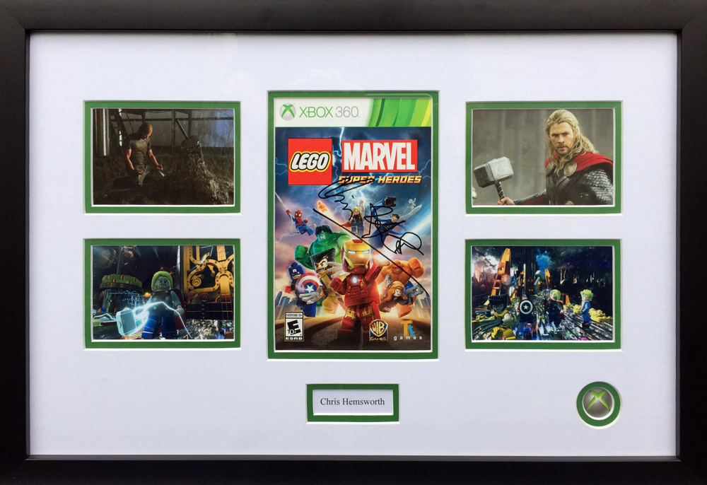 Framed Marvel Superheroes Game Cover Signed by Chris Hemsworth
